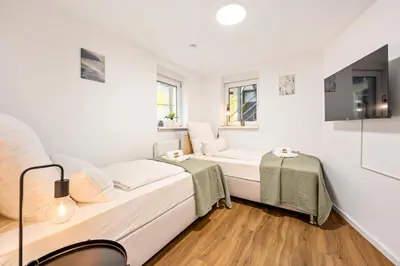 Ein Bett oder Betten in einem Zimmer der Unterkunft Sali Homes Ziegeleihaus