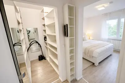 Ein Bett oder Betten in einem Zimmer der Unterkunft Moderne 3-Zi, King-Size Betten, Küche, Badewanne