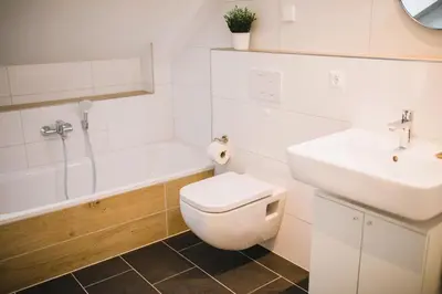 Ein Badezimmer in der Unterkunft HUGOS Design Apartment am Waldrand - ruhig & modern