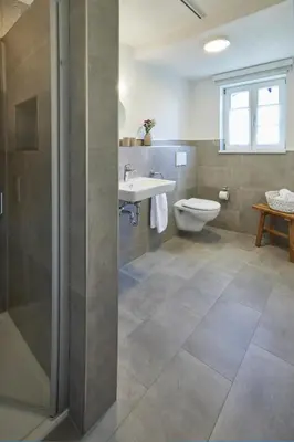 Ein Badezimmer in der Unterkunft Winzerlodge, Wohnung Riesling