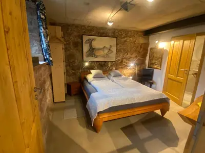 Ein Bett oder Betten in einem Zimmer der Unterkunft Mauersegler