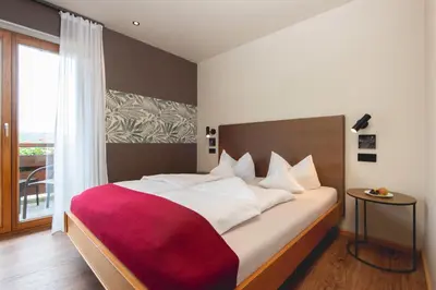 Ein Bett oder Betten in einem Zimmer der Unterkunft Hotel Restaurant Martha