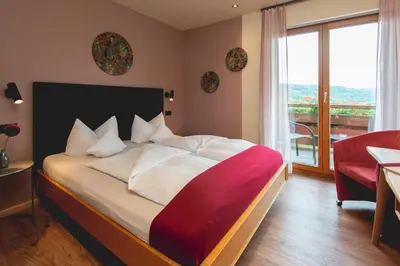 Ein Bett oder Betten in einem Zimmer der Unterkunft Hotel Restaurant Martha