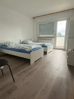 Ein Bett oder Betten in einem Zimmer der Unterkunft Monteur- und Ferienwohnung Hemsbach