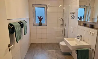 Ein Badezimmer in der Unterkunft Ferienwohnung bei Tripsdrill - ideal für Familien