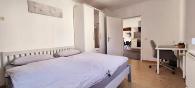 Ein Bett oder Betten in einem Zimmer der Unterkunft Apartment Neckarglück