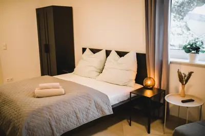 Ein Bett oder Betten in einem Zimmer der Unterkunft HUGOS Studio Apartment