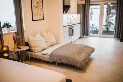 Ein Sitzbereich in der Unterkunft HUGOS Studio Apartment