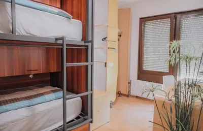 Ein Bett oder Betten in einem Zimmer der Unterkunft Gruppen-Bungalow Stuttgart