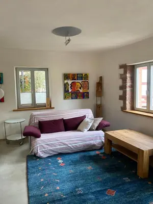 Ein Bett oder Betten in einem Zimmer der Unterkunft Denkmal - Alte Schleiferei
