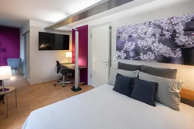 Ein Bett oder Betten in einem Zimmer der Unterkunft Apartment 