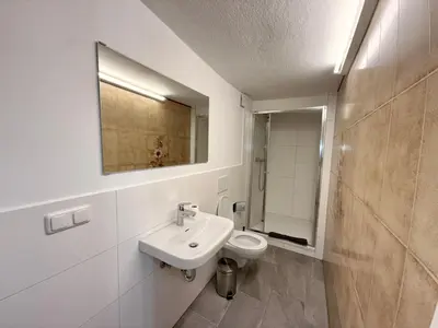 Ein Badezimmer in der Unterkunft Boardinghouse Zur Rose