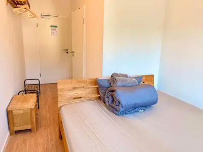 Ein Bett oder Betten in einem Zimmer der Unterkunft Boardinghouse Zur Rose