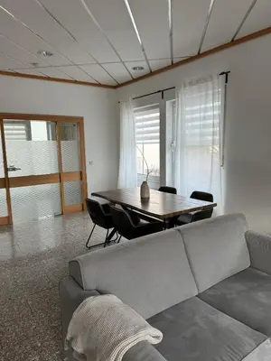 Ein Sitzbereich in der Unterkunft Ferienhaus Alte Bank in Göcklingen
