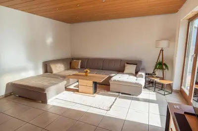 Ein Sitzbereich in der Unterkunft Cozy Holiday Home