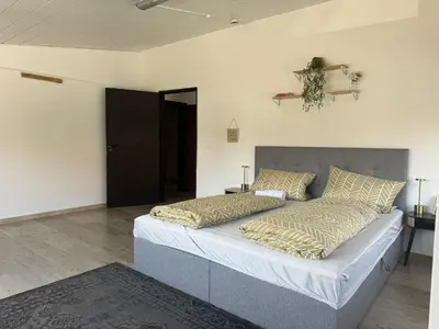 Ein Bett oder Betten in einem Zimmer der Unterkunft Lunetha Homes