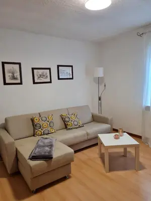 Ein Sitzbereich in der Unterkunft Wohnung mit Wintergarten