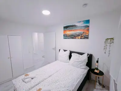 Ein Bett oder Betten in einem Zimmer der Unterkunft Charmantes schickes Apartment