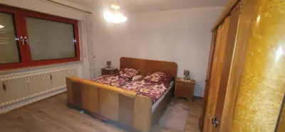 Ein Bett oder Betten in einem Zimmer der Unterkunft Ferienwohnungen Am Sportplatz im Gorxheimertal