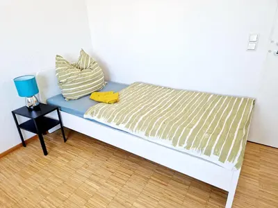 Ein Bett oder Betten in einem Zimmer der Unterkunft Relax Wohnung WAT