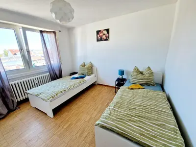 Ein Bett oder Betten in einem Zimmer der Unterkunft Relax Wohnung WAT