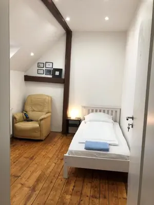 Ein Bett oder Betten in einem Zimmer der Unterkunft Monteurhaus 5 Zimmer