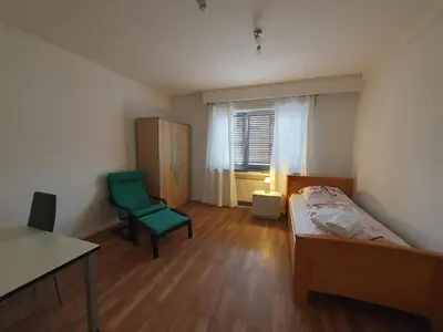 Ein Bett oder Betten in einem Zimmer der Unterkunft Privatzimmer an der Universitätsklinik Mainz