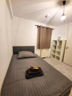 Ein Bett oder Betten in einem Zimmer der Unterkunft Golden Star