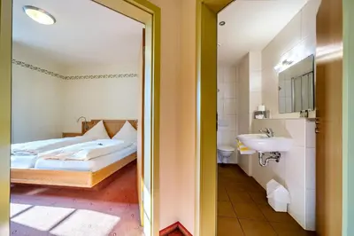 Ein Bett oder Betten in einem Zimmer der Unterkunft Schlosshotel Ravenstein