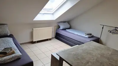 Ein Bett oder Betten in einem Zimmer der Unterkunft 2 x Einzelbett Studio