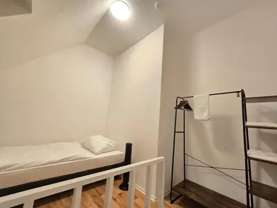 Ein Bett oder Betten in einem Zimmer der Unterkunft Apartments EFDE Boardinghouse Heilbronn