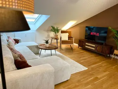Ein Sitzbereich in der Unterkunft 2-Zimmer Apartment - Zentral über den Dächern von Aschaffenburg - 5 min vom HBF - Gegenüber City Galerie