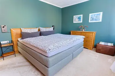 Ein Bett oder Betten in einem Zimmer der Unterkunft Fröhlich Wohnen in Fewo Frölich