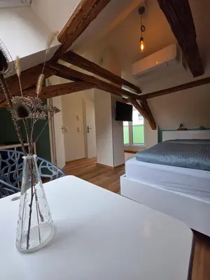 Ein Bett oder Betten in einem Zimmer der Unterkunft Froschgass Apartments