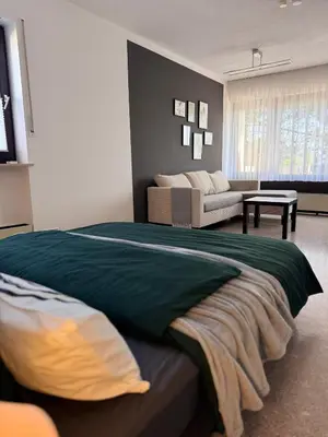 Ein Bett oder Betten in einem Zimmer der Unterkunft La Inside Apartment