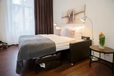 Ein Bett oder Betten in einem Zimmer der Unterkunft Boardinghouse Luise 5