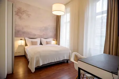 Ein Bett oder Betten in einem Zimmer der Unterkunft Boardinghouse Luise 5