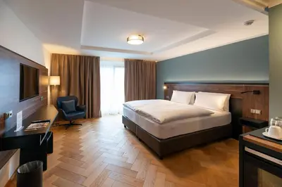 Ein Bett oder Betten in einem Zimmer der Unterkunft UNICO Boutique Hotel