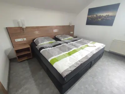 Ein Bett oder Betten in einem Zimmer der Unterkunft My-Skypalace Bad Rappenau