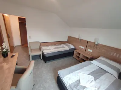 Ein Bett oder Betten in einem Zimmer der Unterkunft My-Skypalace Bad Rappenau