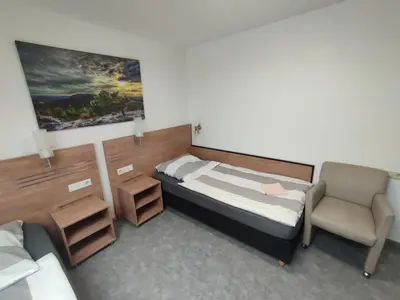 Ein Bett oder Betten in einem Zimmer der Unterkunft My-Skypalace Bad Rappenau