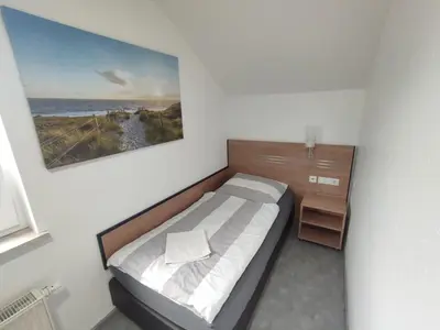 Ein Bett oder Betten in einem Zimmer der Unterkunft My-Skypalace Bad Rappenau