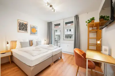 Ein Bett oder Betten in einem Zimmer der Unterkunft Ruhige Wohnung zentral am Residenzschloss