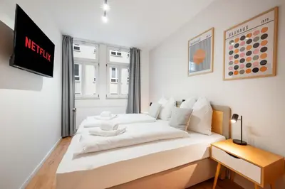 Ein Bett oder Betten in einem Zimmer der Unterkunft Ruhige Wohnung zentral am Residenzschloss