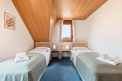 Ein Bett oder Betten in einem Zimmer der Unterkunft Ferienwohnung 