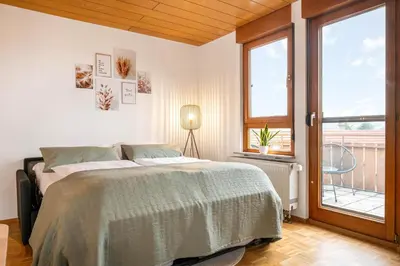 Ein Bett oder Betten in einem Zimmer der Unterkunft Ferienwohnung 