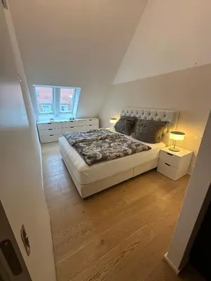 Ein Bett oder Betten in einem Zimmer der Unterkunft Panthouse Wohnung Ludwigsburg Zentrum