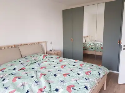 Ein Bett oder Betten in einem Zimmer der Unterkunft Wohnen am Rhein, zentrumsnah, Mietvertrag obligatorisch
