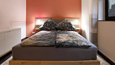 Ein Bett oder Betten in einem Zimmer der Unterkunft Schicke Souterrainwohnung
