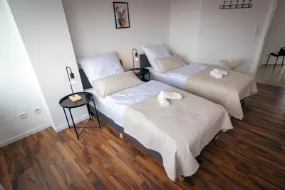 Ein Bett oder Betten in einem Zimmer der Unterkunft 2BR - Apartment Lichtblick